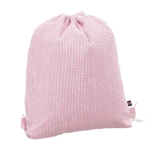 RED SEERSUCKER SLING BACKPACK