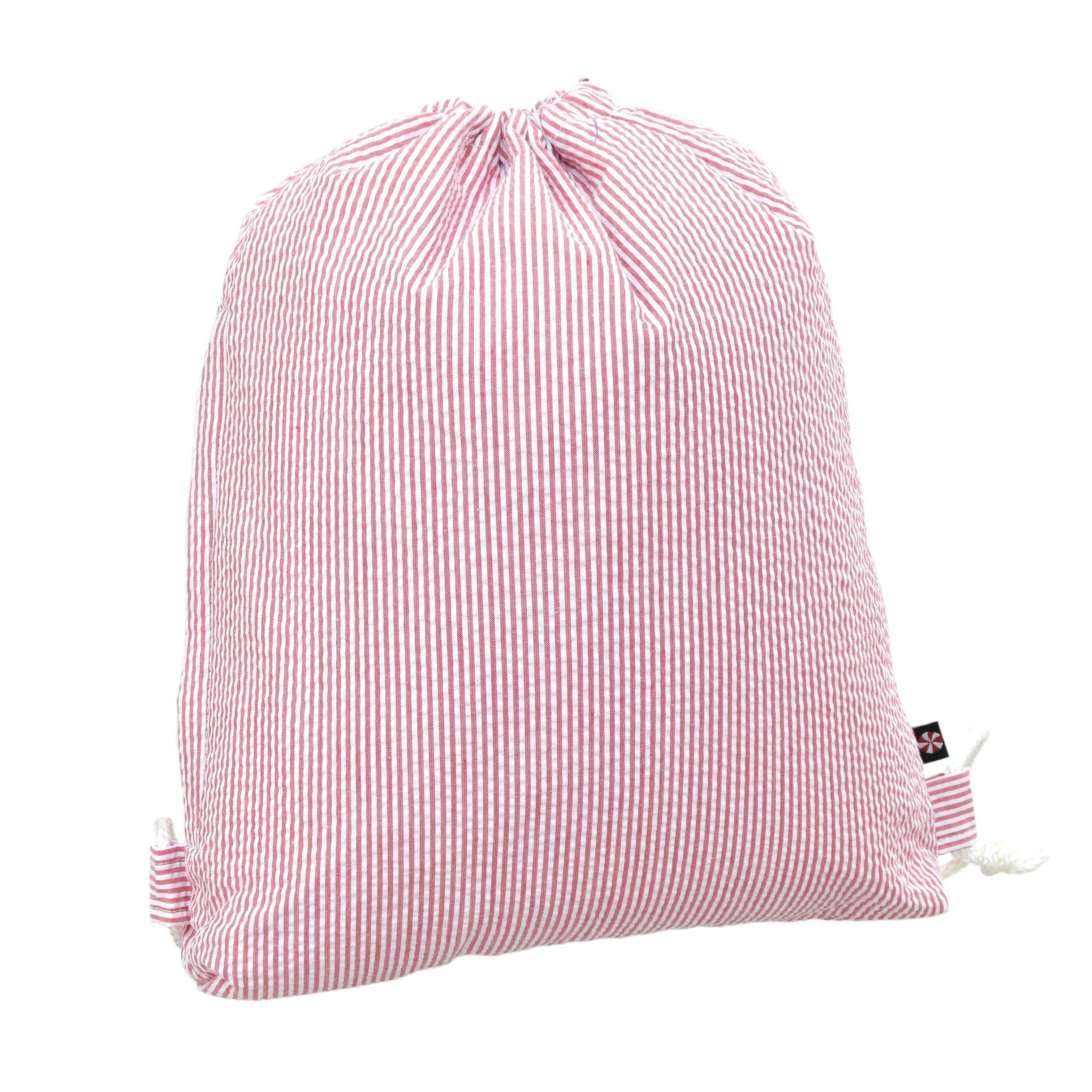 RED SEERSUCKER SLING BACKPACK