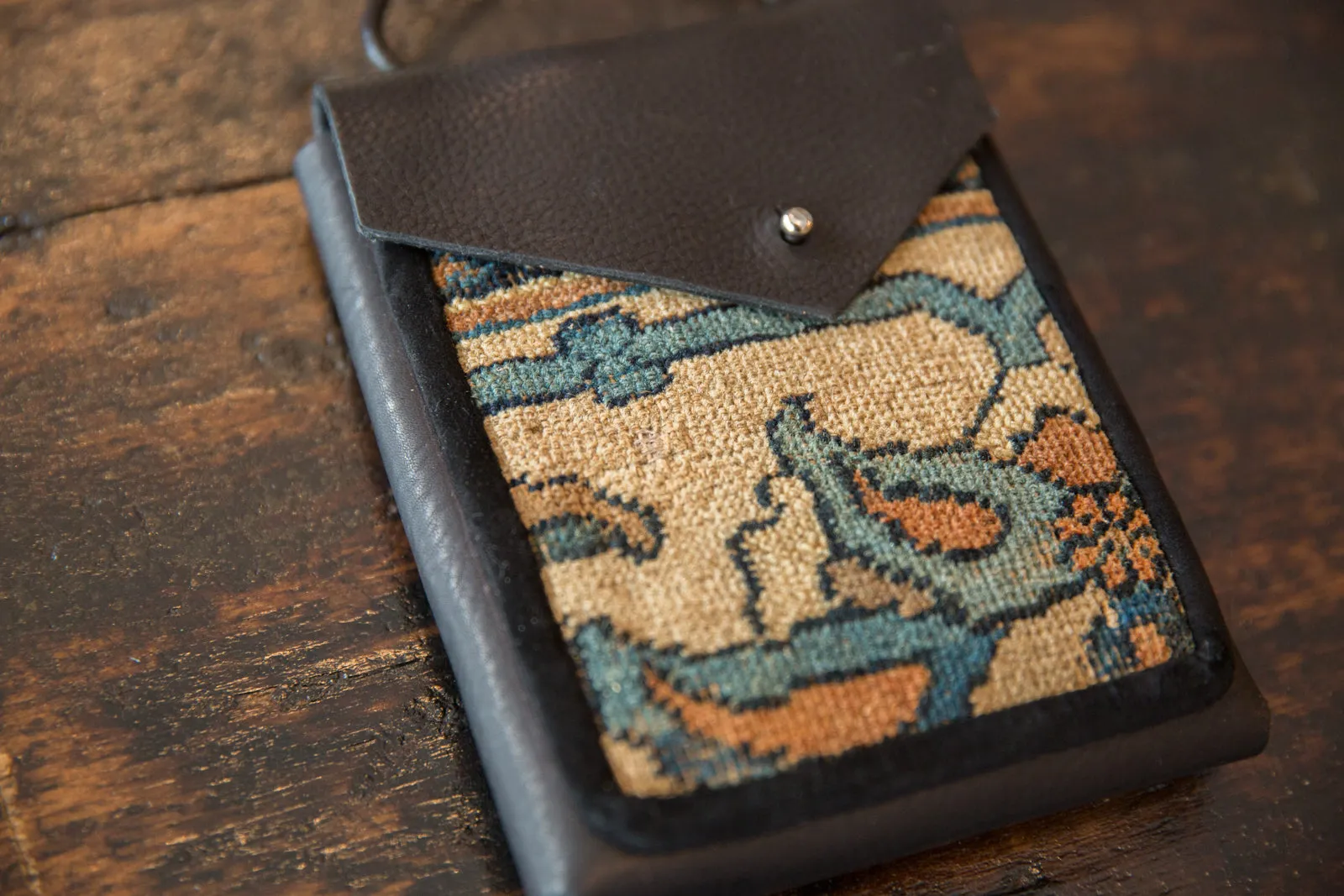Rug Fragment and Leather Shoulder Bag