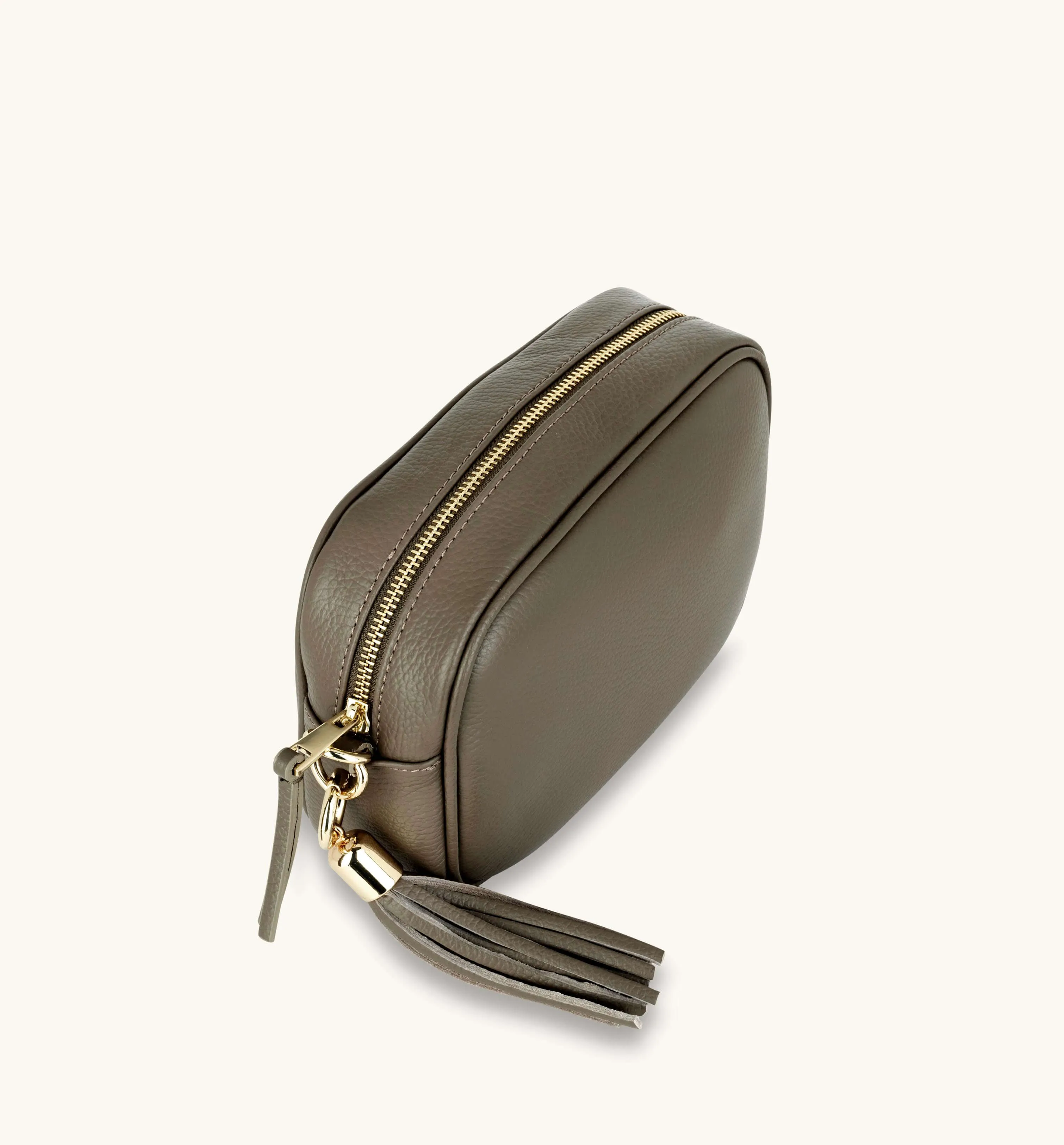 The Tassel Latte Leather Crossbody Bag With Black & Gold Chevron Strap