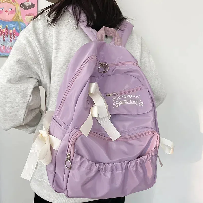UAKISS  -  Fashion Backpack Women Canvas Anti-theft Shoulder Bag for Teenager Girls Bow School Laptop Travel Feminina Backapck Female 2024