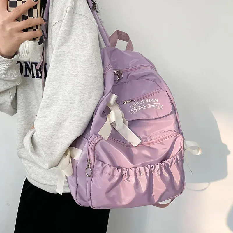 UAKISS  -  Fashion Backpack Women Canvas Anti-theft Shoulder Bag for Teenager Girls Bow School Laptop Travel Feminina Backapck Female 2024