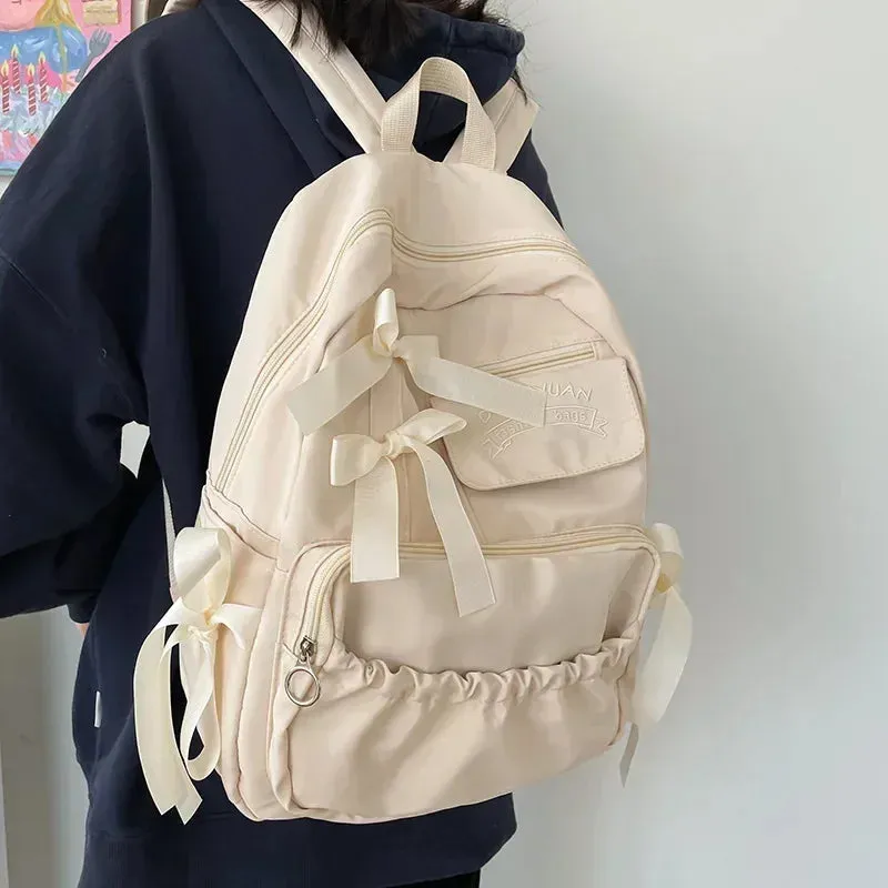 UAKISS  -  Fashion Backpack Women Canvas Anti-theft Shoulder Bag for Teenager Girls Bow School Laptop Travel Feminina Backapck Female 2024